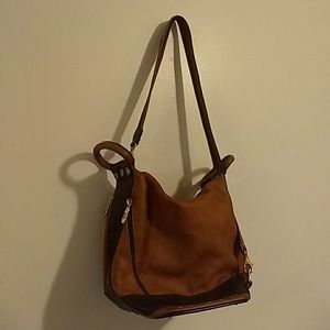 Valentina black and brown leather sling backpack